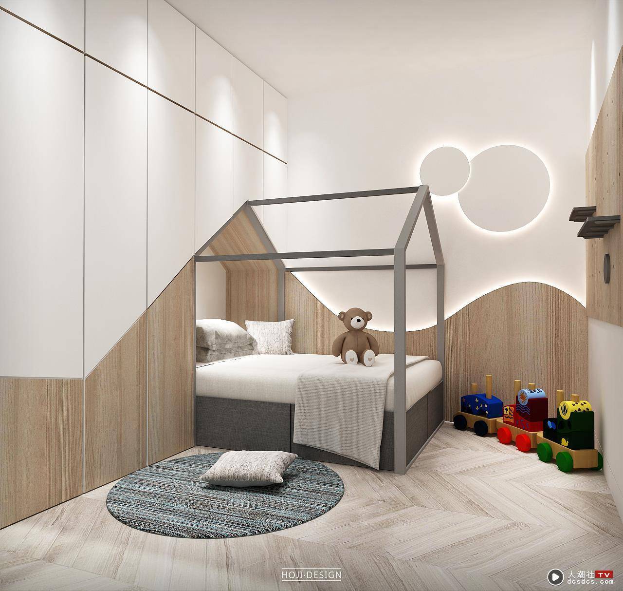 儿童房利用储物空间与儿童床做结合，弧线背景墙与衣柜的直线装饰造型在视觉上及有冲突又具有联系。